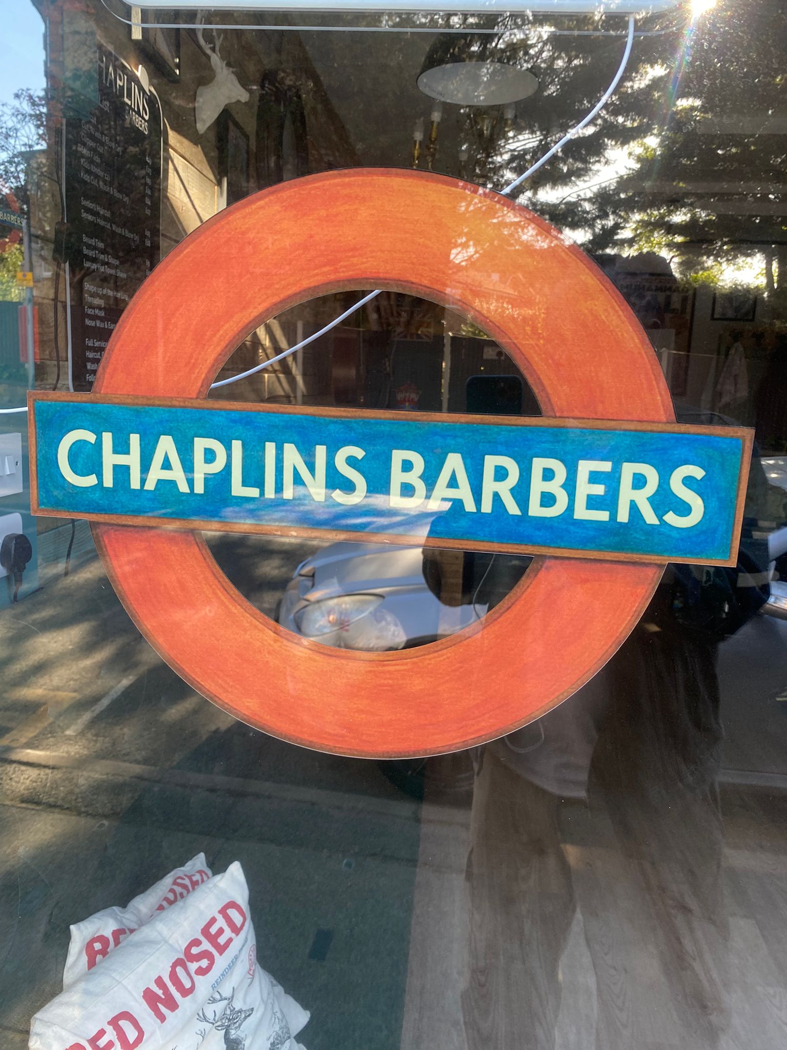 Chaplins Barbers London Underground roundel