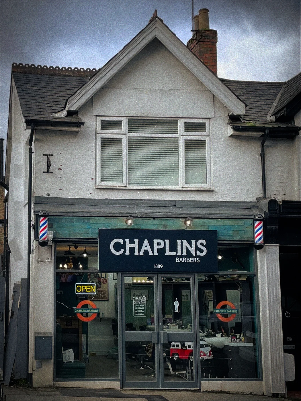 Chaplins Barbers shopfront in Sevenoaks — 1889 written on the signage